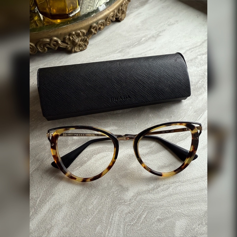 Prada Women's Glasses in Tortoise Pattern